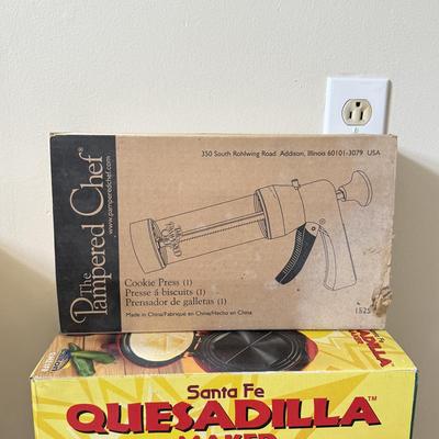 LOT 104K: Kitchen Collection: Santa Fe Quesadilla Maker, Pampered Chef Cookie Press, Cuisinart Toaster Oven Model TOB-40N (DL)