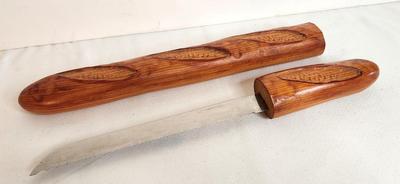 Lot #88 Scarce Vintage Cuzin French Wooden Carved Bread Knife.