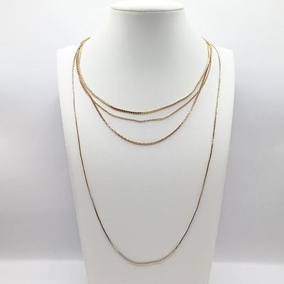 LOT 6: Collection of Gold-Tone Necklaces, Earrings and Sarah Coventry Pendant