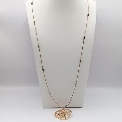 LOT 6: Collection of Gold-Tone Necklaces, Earrings and Sarah Coventry Pendant