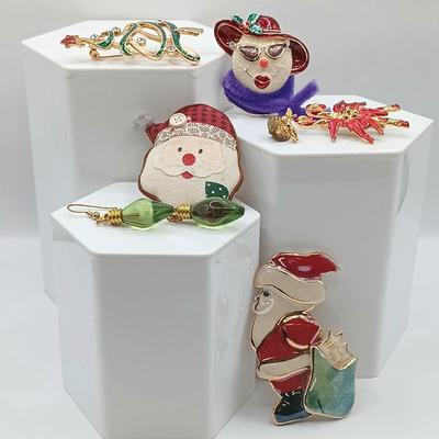 LOT 9: Vintage Holiday Brooches and Earrings