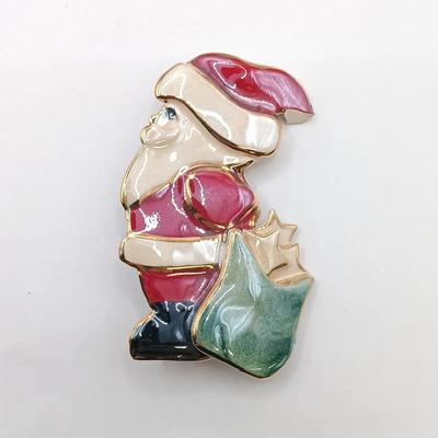 LOT 9: Vintage Holiday Brooches and Earrings