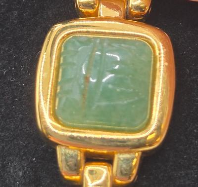 LOT 25: Gold-tone Cuff Bracelet, Gold-tone Spring Open Bracelet w/ Amber Colored Gems, and Kenneth Jay Lane Scarab Gemstone Watch