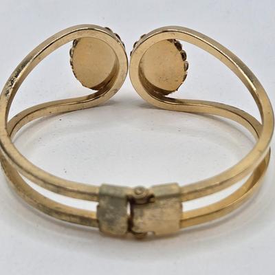 LOT 25: Gold-tone Cuff Bracelet, Gold-tone Spring Open Bracelet w/ Amber Colored Gems, and Kenneth Jay Lane Scarab Gemstone Watch