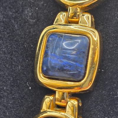 LOT 25: Gold-tone Cuff Bracelet, Gold-tone Spring Open Bracelet w/ Amber Colored Gems, and Kenneth Jay Lane Scarab Gemstone Watch