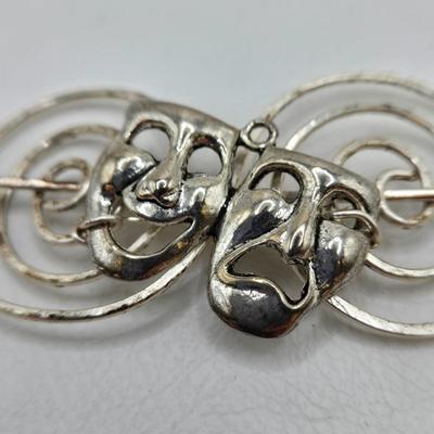 LOT 29: Three Hand-Crafted Metal Hair Accessories