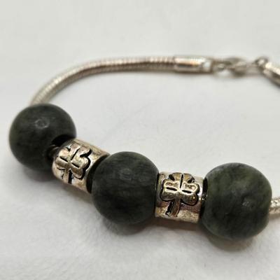 LOT 31: Beautiful Multi-Colored Bead Bracelet, Green Bead and Silver Shamrock Charm Bracelet, and Silver-tone Abalone Bracelet