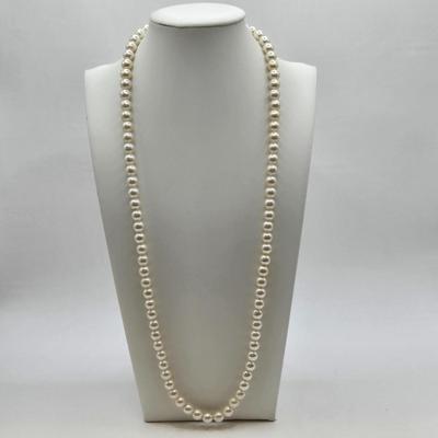 LOT 33: Three Faux Pearl Neclaces, Multiple Strand Pearl-like Necklace w/ Gold-tone Clasp, and Gold-tone and Pearl-like Clip Earrings