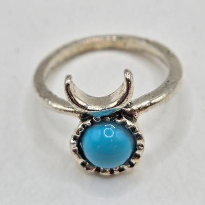 LOT 37: Jubilee Cross on 15 in. Trifari Chain, Religious Charm on 24 in. Silver Chain, Silver-tone and Turquoise Like Bead Rings, and More