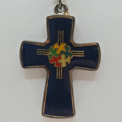 LOT 37: Jubilee Cross on 15 in. Trifari Chain, Religious Charm on 24 in. Silver Chain, Silver-tone and Turquoise Like Bead Rings, and More