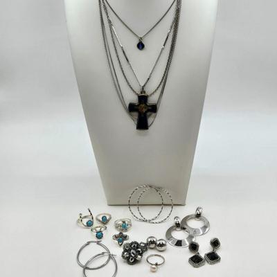 LOT 37: Jubilee Cross on 15 in. Trifari Chain, Religious Charm on 24 in. Silver Chain, Silver-tone and Turquoise Like Bead Rings, and More