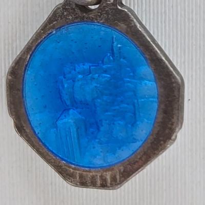 LOT 37: Jubilee Cross on 15 in. Trifari Chain, Religious Charm on 24 in. Silver Chain, Silver-tone and Turquoise Like Bead Rings, and More
