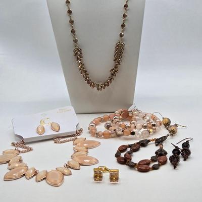 LOT 40: Gold-tone and Rose Colored Gemstone Necklace, Salmon Colored Necklace w/ Matching Earrings, 2 Bracelet and Earring Sets, and...