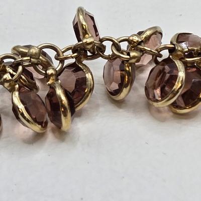 LOT 40: Gold-tone and Rose Colored Gemstone Necklace, Salmon Colored Necklace w/ Matching Earrings, 2 Bracelet and Earring Sets, and...