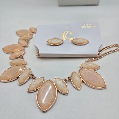 LOT 40: Gold-tone and Rose Colored Gemstone Necklace, Salmon Colored Necklace w/ Matching Earrings, 2 Bracelet and Earring Sets, and...