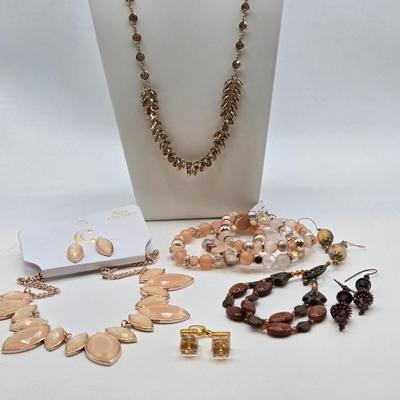 LOT 40: Gold-tone and Rose Colored Gemstone Necklace, Salmon Colored Necklace w/ Matching Earrings, 2 Bracelet and Earring Sets, and...