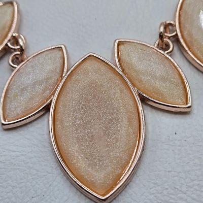 LOT 40: Gold-tone and Rose Colored Gemstone Necklace, Salmon Colored Necklace w/ Matching Earrings, 2 Bracelet and Earring Sets, and...