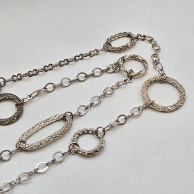 LOT 41: Multiple Black and Silver-tone Neclaces and Pair of Matching Earrings