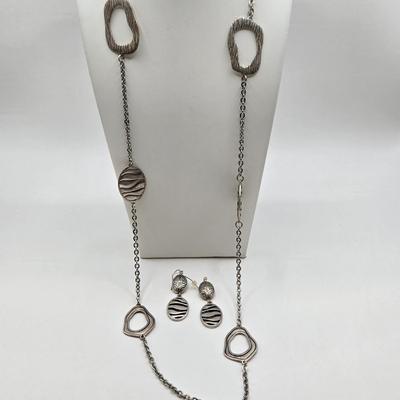 LOT 41: Multiple Black and Silver-tone Neclaces and Pair of Matching Earrings