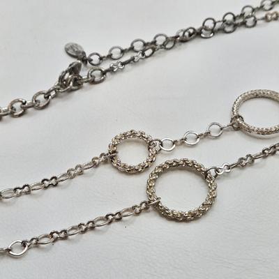 LOT 41: Multiple Black and Silver-tone Neclaces and Pair of Matching Earrings