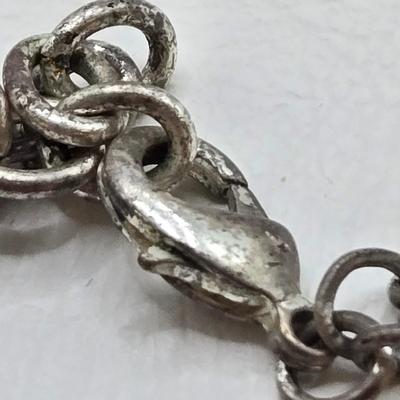 LOT 41: Multiple Black and Silver-tone Neclaces and Pair of Matching Earrings