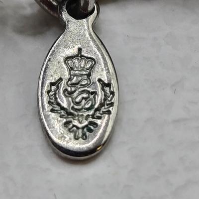 LOT 41: Multiple Black and Silver-tone Neclaces and Pair of Matching Earrings