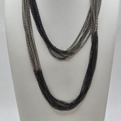 LOT 41: Multiple Black and Silver-tone Neclaces and Pair of Matching Earrings