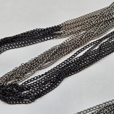 LOT 41: Multiple Black and Silver-tone Neclaces and Pair of Matching Earrings