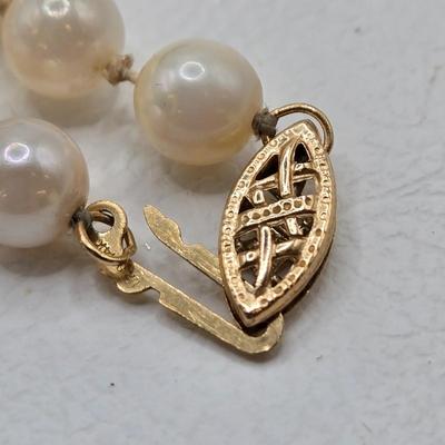 LOT 47: 26 Inch Cultured Pearl Necklace and Earring Set