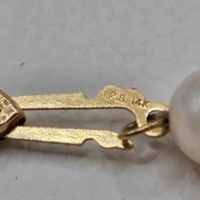 LOT 47: 26 Inch Cultured Pearl Necklace and Earring Set