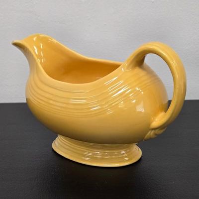 LOT 49: Fiesta Ware Bowl and Gravy Boat, Vintage Bonzo Salt & Pepper Shakers & More