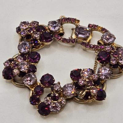 LOT 79: Capri Purple Art Glass Pendant Necklace, Two Tone Purple Rhinestone Bracelet w/ Safety Clasp, and One Matching Clip Earring