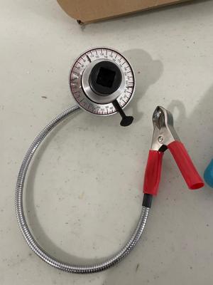 Plumbing wrench and torque gauge