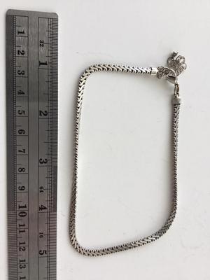 Unmarked chain like silver tone adjustable bracelet