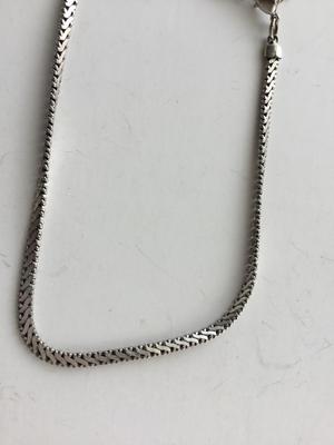 Unmarked chain like silver tone adjustable bracelet