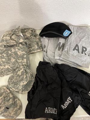 Army uniform with hats, shirts, and shorts