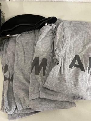 Army uniform with hats, shirts, and shorts