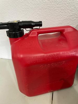Gas can, oil container (fairly full) & mower bag