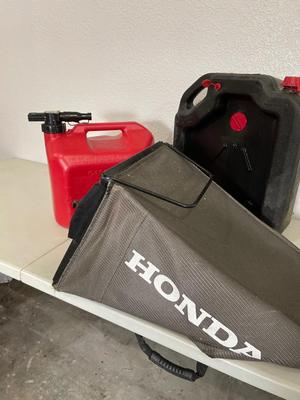 Gas can, oil container (fairly full) & mower bag