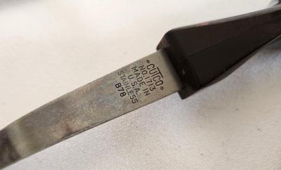 Lot #95 Lot of 3 Implements - CUTCO Scissors in Case, CUTCO slotted spoon, and American Royalty Serrated Knife