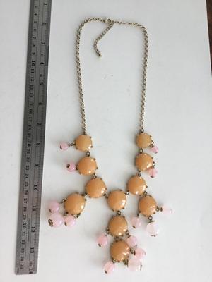 Beautiful orange light pink statement necklace