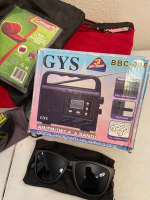 Assortment, sunglasses, Yaktrax, plus