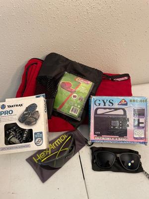 Assortment, sunglasses, Yaktrax, plus