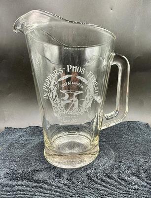 Sale Photo Thumbnail #205: 6 glasses and matching pitcher.  Designs are etched into the glass. All in good condition.