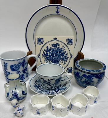 Sale Photo Thumbnail #218: Includes a vintage WWII era US Navy Mess Plate, a tile trivet, cups, napkin rings, cup & saucer, small flower pot, and a small duck figurine.