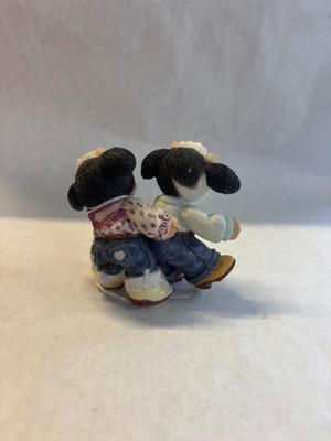 Merry moo figurine