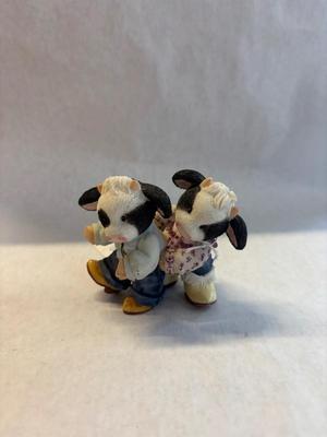 Merry moo figurine