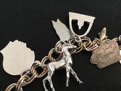 Vintage Charm Bracelet Has Several Sterling charms