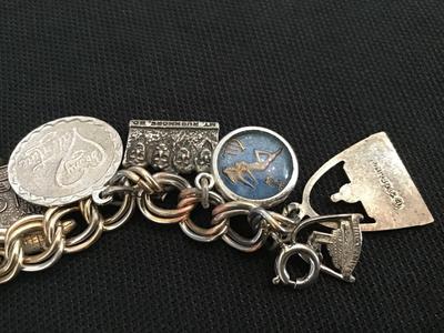 Vintage Charm Bracelet Has Several Sterling charms