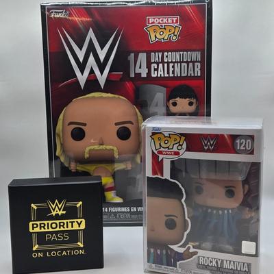 LOT 6: Pocket Pops 14 Day Wrestling Calendar, Wrestle Mania Priority Pass, and Rocky Maivia Pop NIB